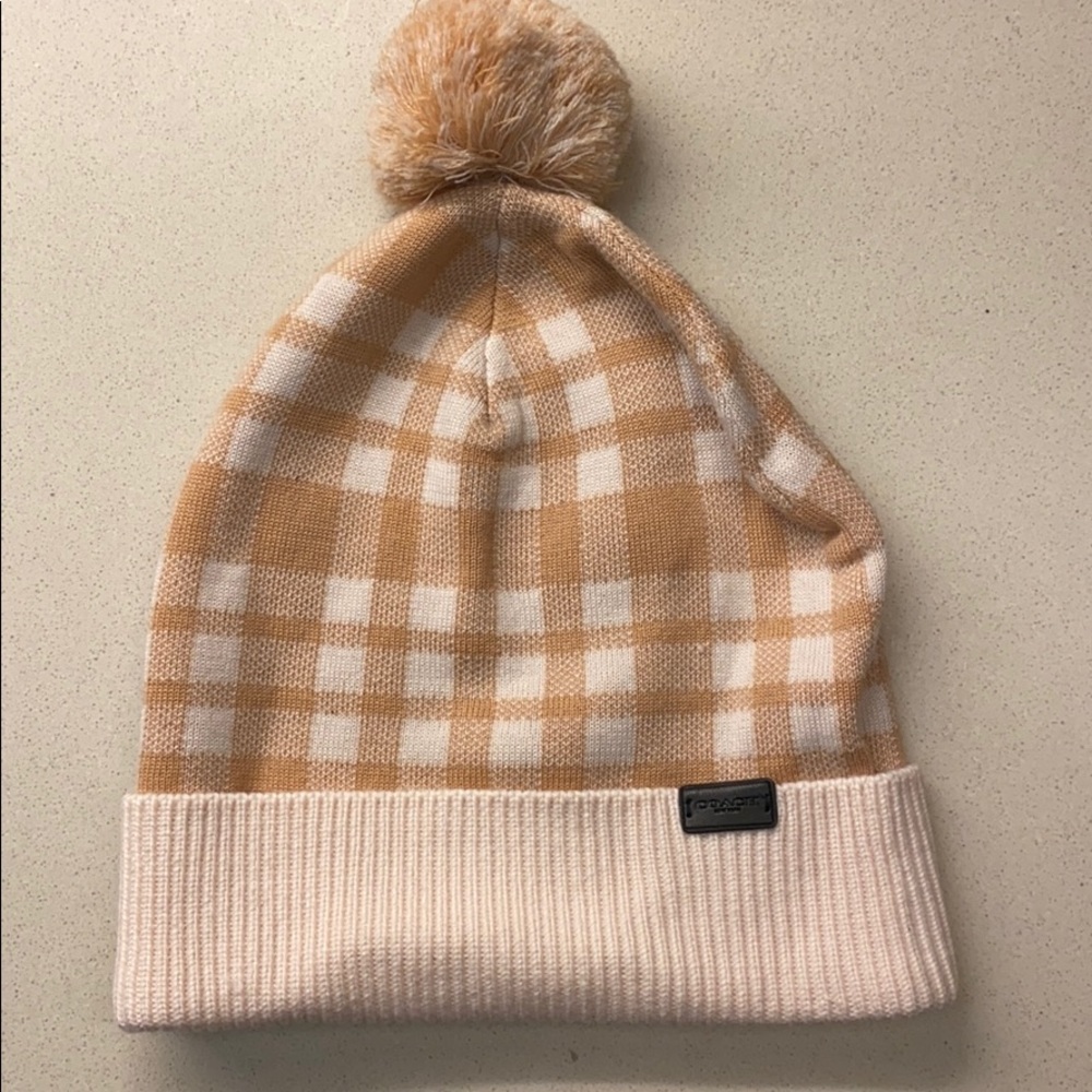 Check Coach pompom hat